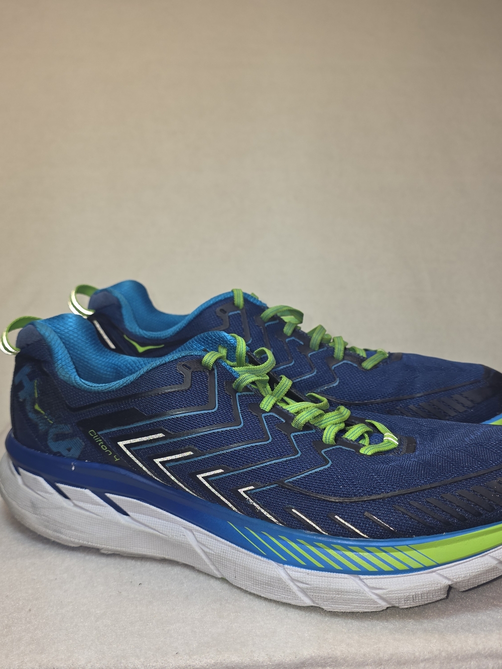 Men's Hoka Clifton 4 Blue Running Shoes with Green Accents